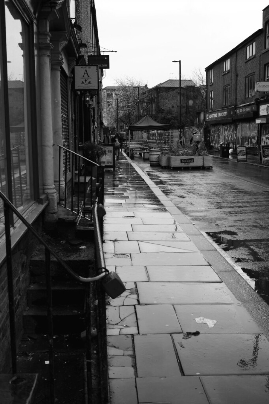 A rainy northern street in black and white